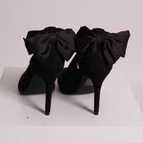 Talons hauts avec boucles noires