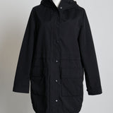 Manteau mi-long à texture douce à l'intérieur