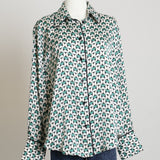 Blouse satinée à motifs géométriques