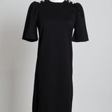 Robe avec boutons brillants sur les épaules