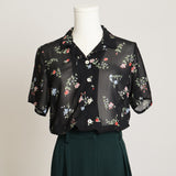 Chemise transparente à motifs florales