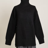 Chandail long en tricot avec col montant côtelé