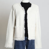 Veste blanche en tweed bouclé avec épaulettes