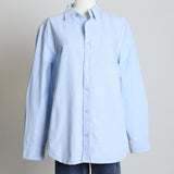 Chemise avec poche à la poitrine