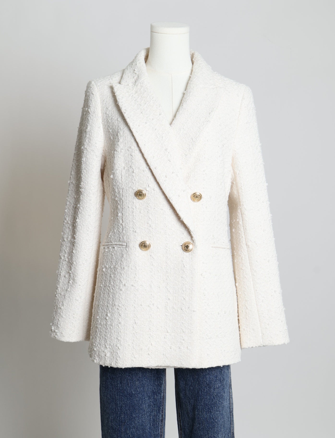 Veston à double boutonnage en tweed bouclé avec boutons dorés