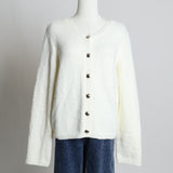 Cardigan en bouclé à col rond et boutons argents