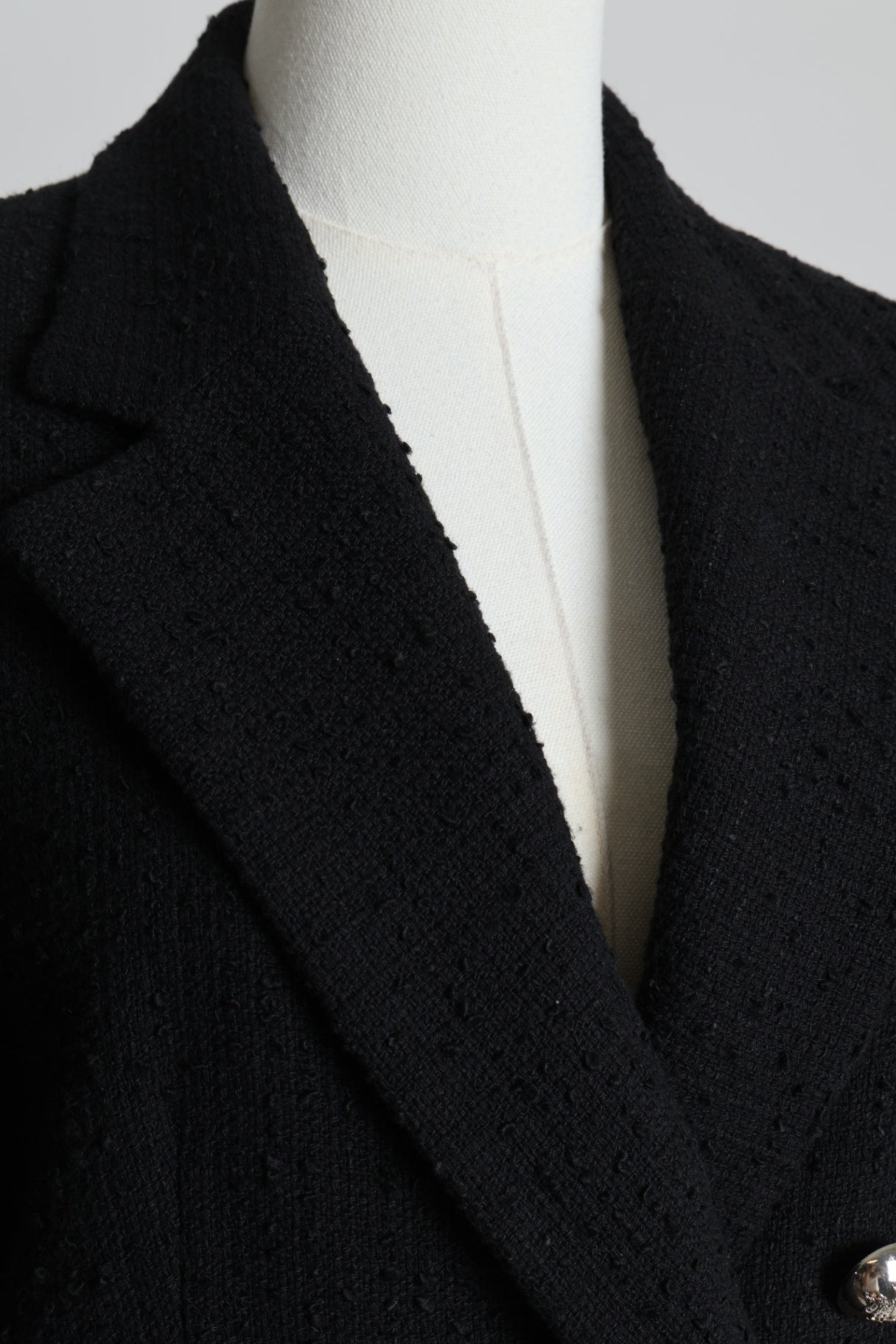 Veston en tweed avec boutons dorés