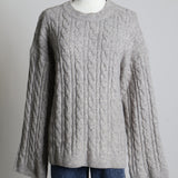 Pull à col rond et en maille torsadée classique