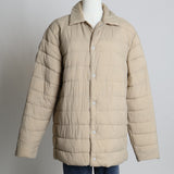 Manteau matelassé à col chemise et boutons-pression
