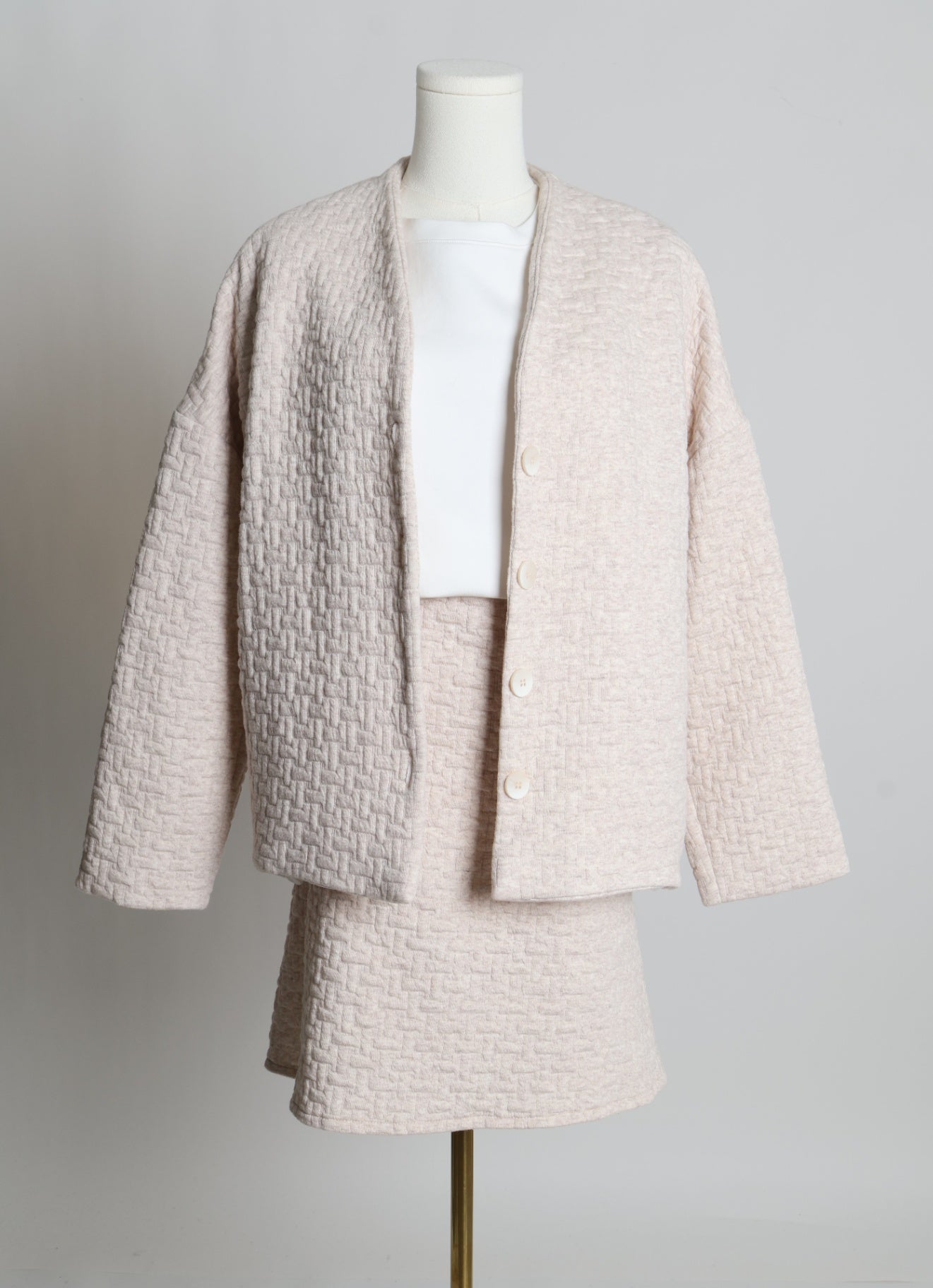 Ensemble jupe et cardigan à motif géométrique gaufré