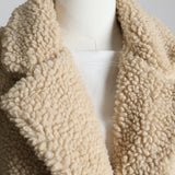 Manteau sherpa avec boutons pression