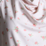 Haut à col licou, dos ouvert et motifs de fleurs
