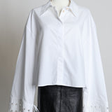 Chemise à manches longues avec poignets ajourés et lacés