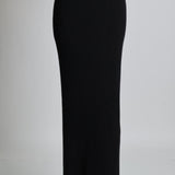 Jupe noire avec fente et élastique à la taille