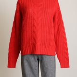 Chandail en tricot avec motifs tressés