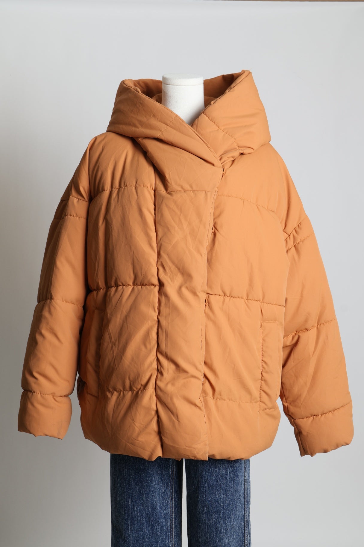 Manteau matelassée avec capuchon