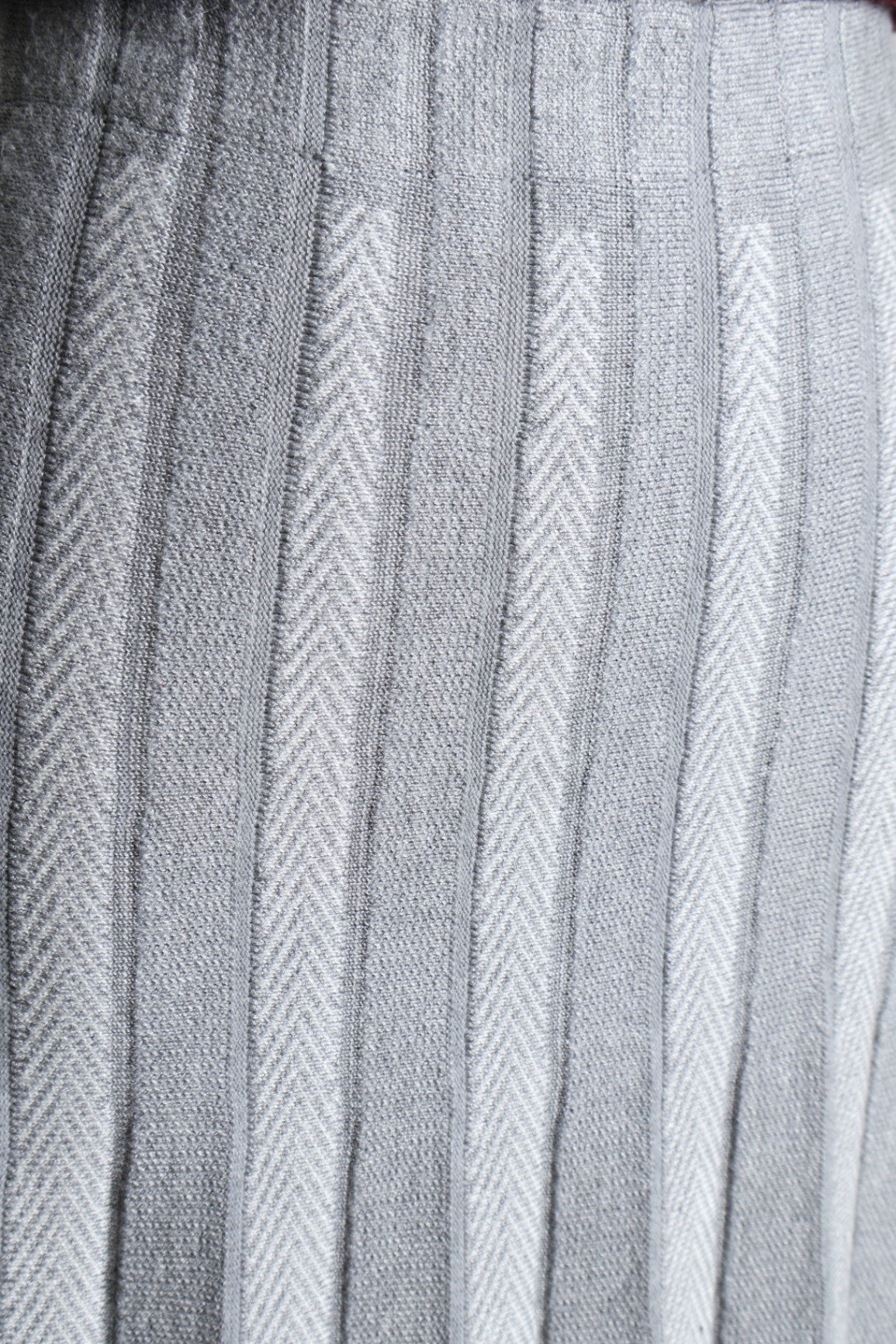 Jupe midi plissée motif chevron
