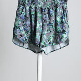 Short de sport motif abstrait