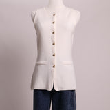 Veste sans manche boutonnée doré en tricot