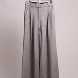 Pantalon à plis et jambes larges